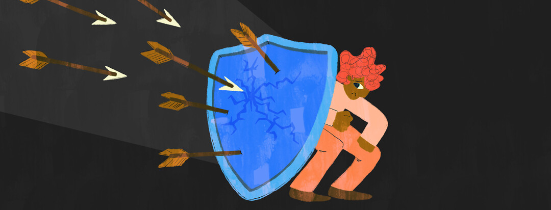 Person cowers behind shield with arrows flying toward it
